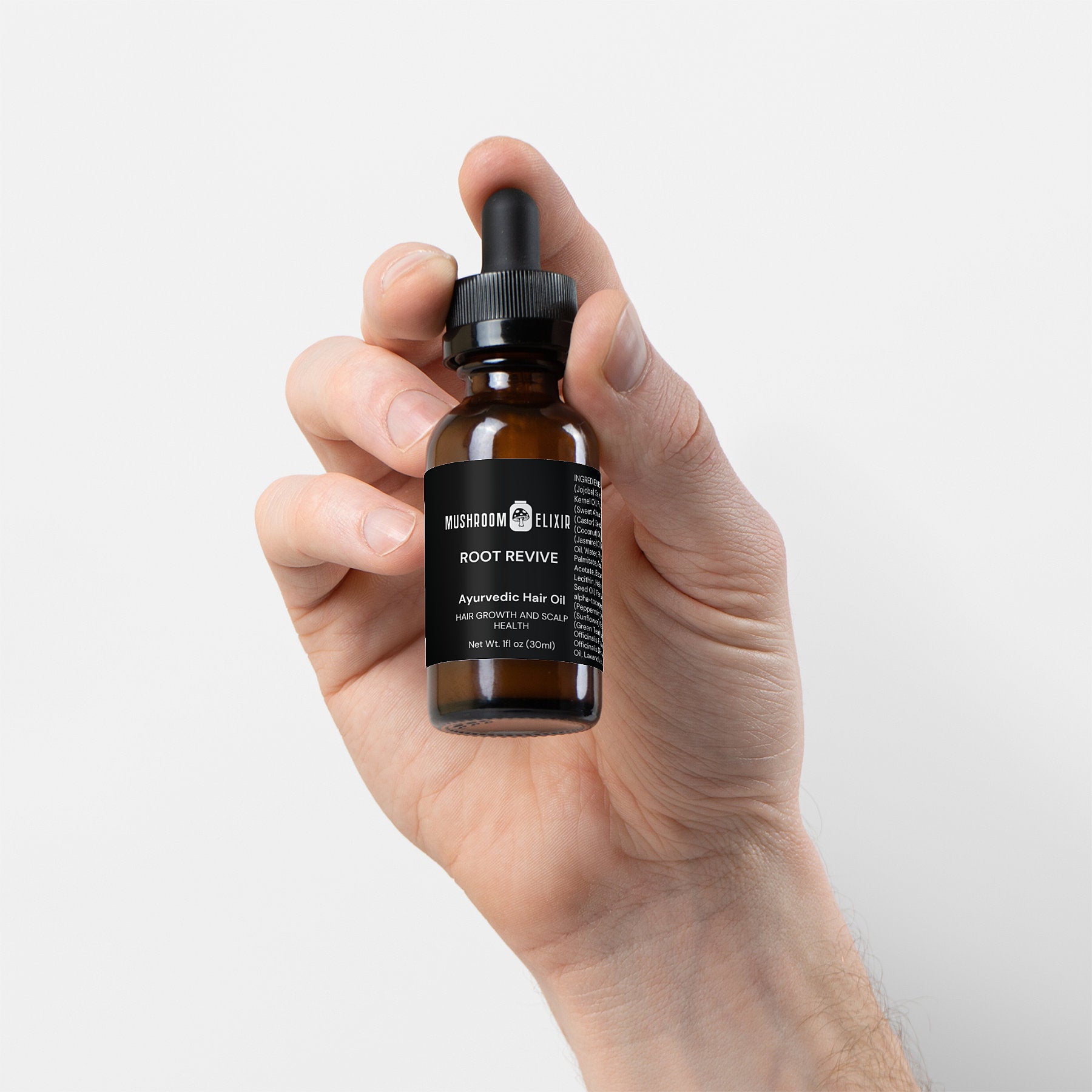 MushroomElixir Root Revive Hair Oil back label with herbal ingredients