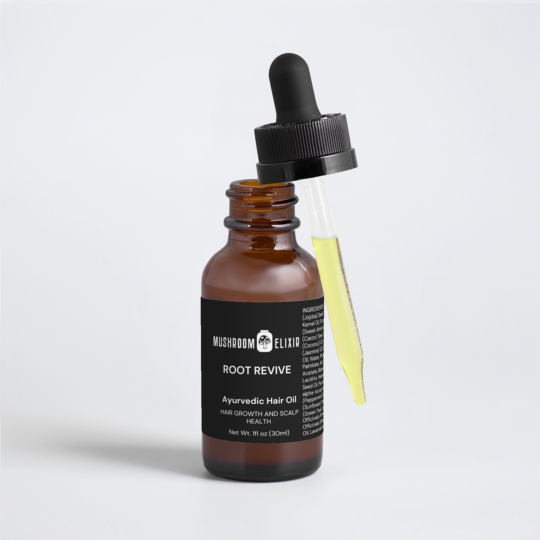MushroomElixir Root Revive Ayurvedic Hair Oil benefits and features label